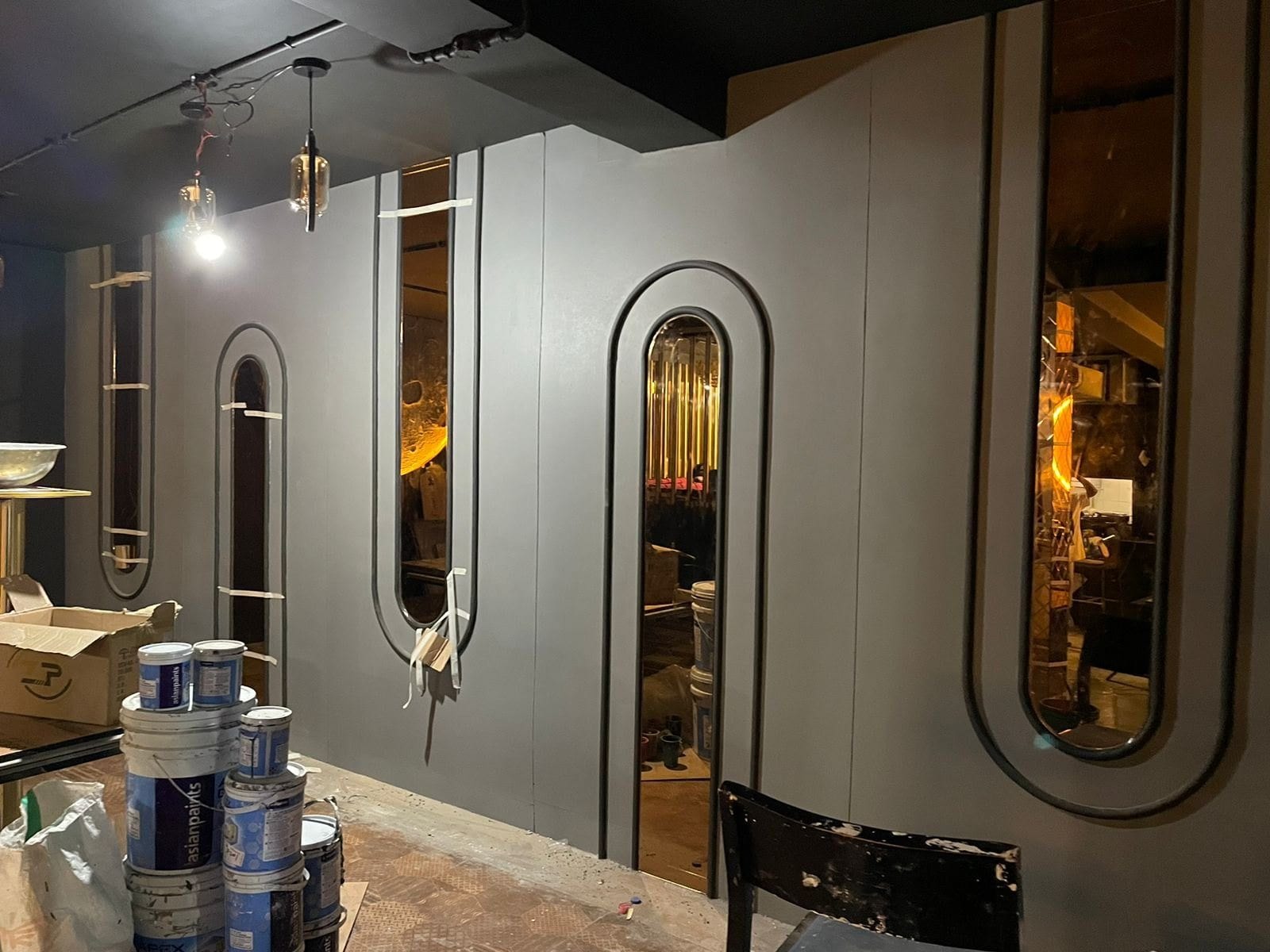Café at Hudson Lane — arched mirror panels along the wall